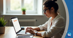 Small business owner in Lorton VA planning content calendar on laptop